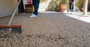 Garage floor leveling with broom finish and aggregate, The Garage Floor Company.