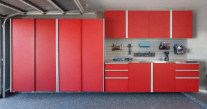 Red custom garage cabinets and shelving maximizing garage space and storage.